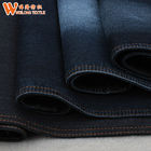 Le blue jeans del nero di 77% C 21% la P 2% la S 9oz mescolano il tessuto del denim del poliestere del cotone