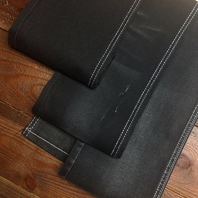 Prezzo buono Colore nero 9oz del denim del cotone di Tencle dei jeans materiali del tessuto in linea