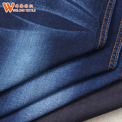 Prezzo buono Blu scuro pesante del denim del cotone di Tencle dei jeans materiali del tessuto in linea