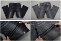 Tessuto nero scuro del denim dei jeans di allungamento di potere del cotone per gli uomini scarni delle donne delle ghette
