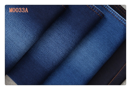 La falsificazione blu scuro del poliestere del cotone della saia del ringrosso ha tricottato il tessuto del denim