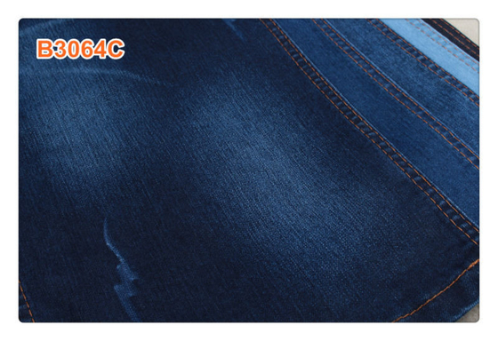 62/63" rivestimento blu scuro eccellente delle donne del tessuto del denim 11oz ha strappato i jeans per gli uomini