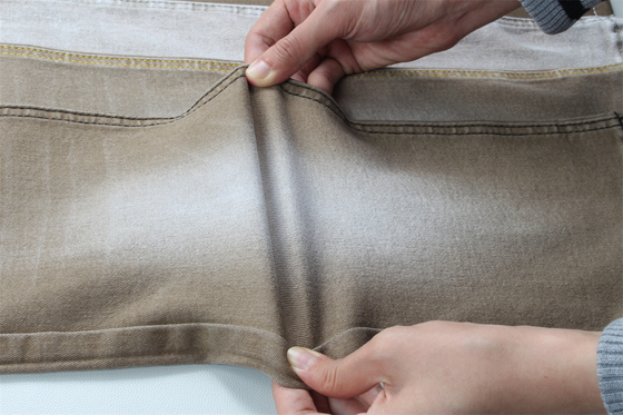 Tissu di denim leggero e colorato in khaki