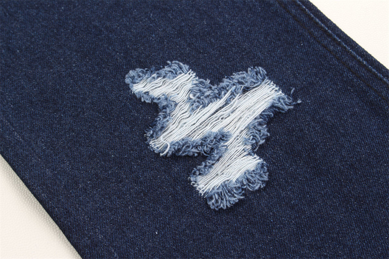 Tessuti rigidi in denim blu scuro per la fabbricazione di jeans, di cotone al 100%