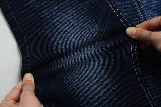 12 Oz Prezzo affilato Tessile denim a basso tratto per l'uomo Indossare jeans nero sul retro Prezzo competitivo da Weilong Textile