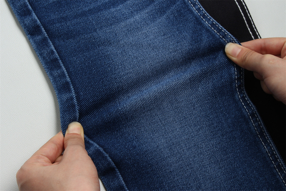 12 Oz Prezzo affilato Tessile denim a basso tratto per l'uomo Indossare jeans nero sul retro Prezzo competitivo da Weilong Textile