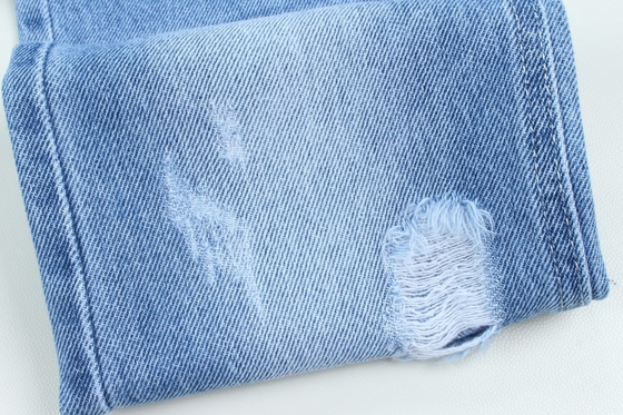Ingrosso 7000 metri Stock 10,5 oz 100% cotone rigido jeans tessuto