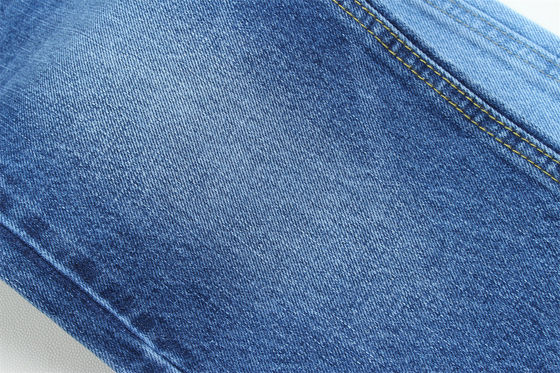 Tessuto denim rigido da 12,5 once con effetto slub sull'ordito per jeans di marca, 100% cotone, blu scuro