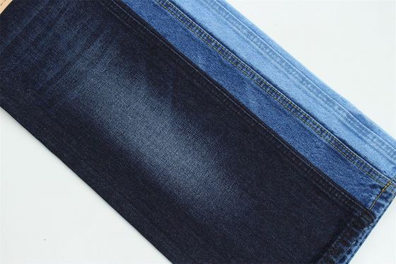 Tessuto denim rigido da 12,5 once con effetto slub sull'ordito per jeans di marca, 100% cotone, blu scuro