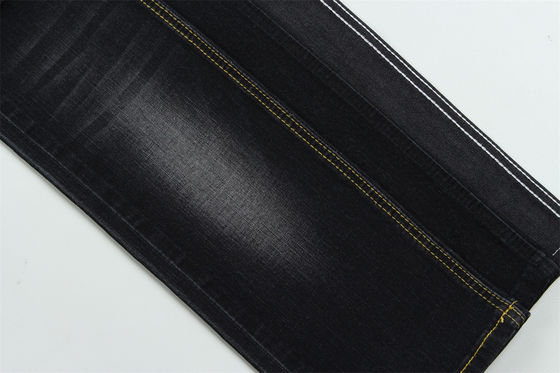 Tessuto denim slub elasticizzato nero scuro per jeans da bambino e da donna