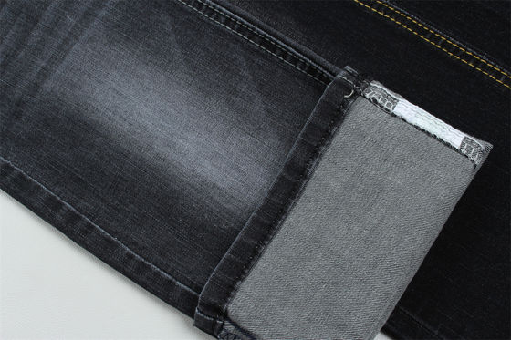 Tessuto denim slub elasticizzato nero scuro per jeans da bambino e da donna
