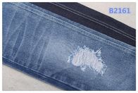 Un materiale crudo pesante 100% di 14 dell'oncia del cotone del denim jeans del tessuto