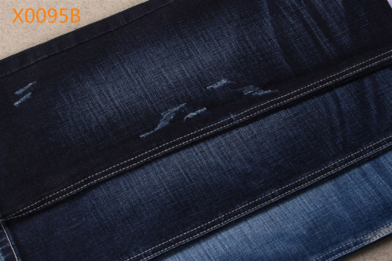 Prezzo buono i lati 11oz due ritorcono facilmente 21,6% il tessuto del denim dell'elastam del cotone del rayon 74% del poliestere 2,4% in linea