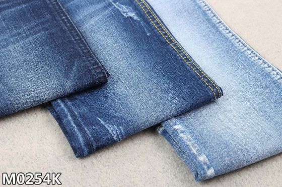 Prezzo buono tessuto del denim del poliestere di 9.5oz Repreve blu scuro con il ringrosso del filo di ordito in linea