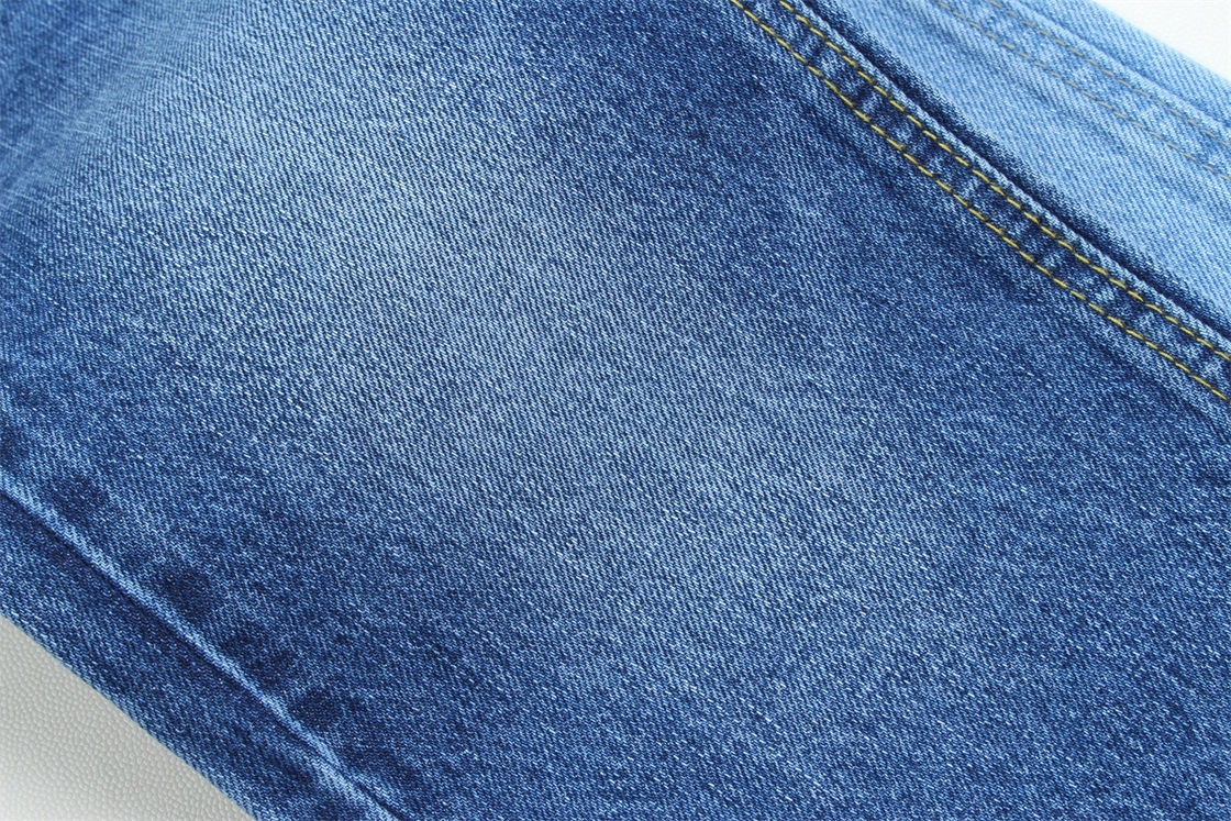 Tessuto denim rigido da 12,5 once con effetto slub sull'ordito per jeans di marca, 100% cotone, blu scuro