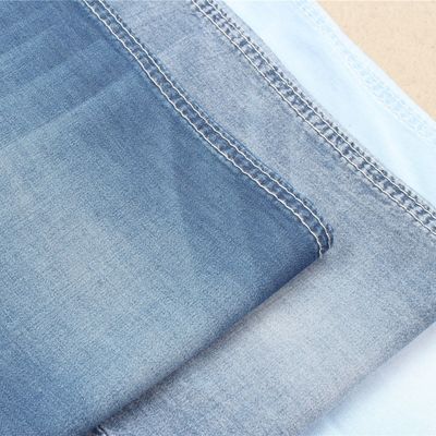 Prezzo buono Produttore blu scuro 100% dei tessuti di colore del denim della camicia di cotone in linea