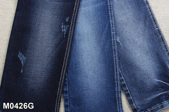Prezzo buono Alto tessuto 10,3 del denim del ringrosso del filo di ordito di allungamento di OZ per la fabbricazione dei jeans in linea