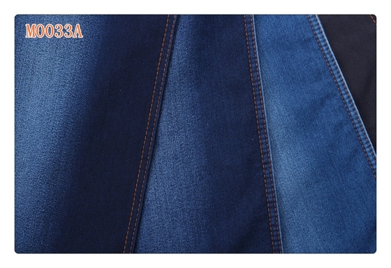 La falsificazione blu scuro del poliestere del cotone della saia del ringrosso ha tricottato il tessuto del denim