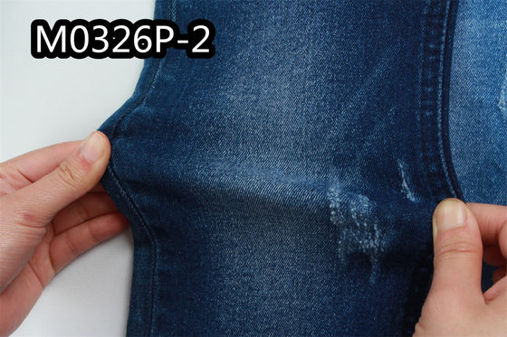 Prezzo buono il tessuto del denim dell'indaco 10oz per le donne equipaggia l'elastam molle crudo del cotone 2% di 98% in linea
