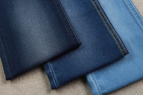 Prezzo buono tessuto blu del denim 362Gsm di 60cm per il materiale di tessitura speciale del denim del rivestimento dei jeans in linea