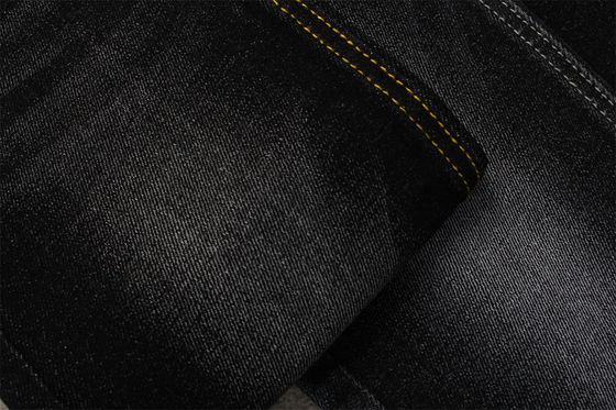 Prezzo buono Tessuto denim elasticizzato in spandex di cotone da 11,5 once nero zolfo 170 cm a tutta larghezza in linea