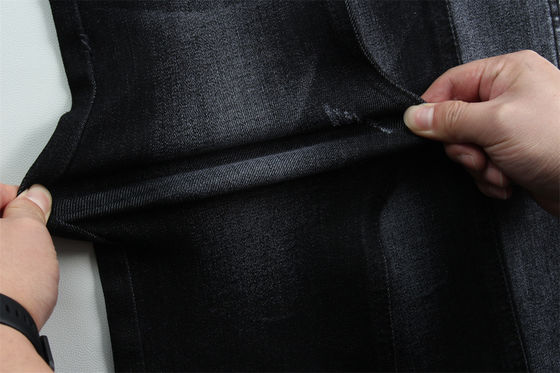 Prezzo buono 11 oz jeans tessuto per uomo o donna stile pesante zolfo colore nero all'ingrosso dalla Cina Guangdong in linea