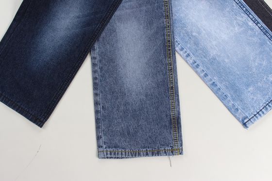 Prezzo buono Maglieria di cotone 100% 7,3 oz tessuti rigidi in jeans blu scuro per jeans in linea