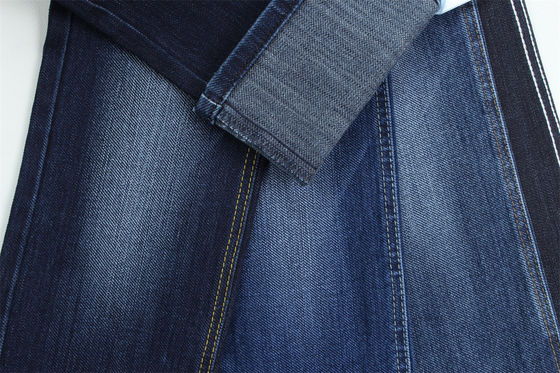 Tessuto denim elasticizzato con trama speciale e effetto cross slub, larghezza 62/63