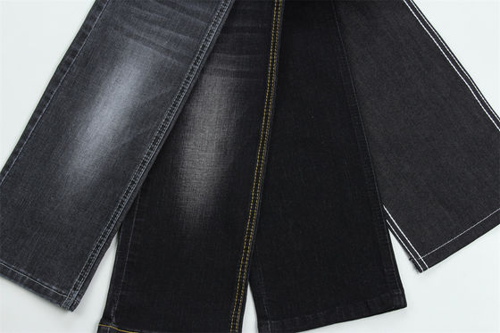 Tessuto denim slub elasticizzato nero scuro per jeans da bambino e da donna