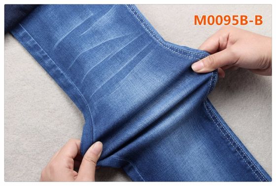 Prezzo buono tessuto eccellente del denim di allungamento di Tencel del cotone 9oz 50 12 di 132cm per i cappotti dei pantaloni in linea