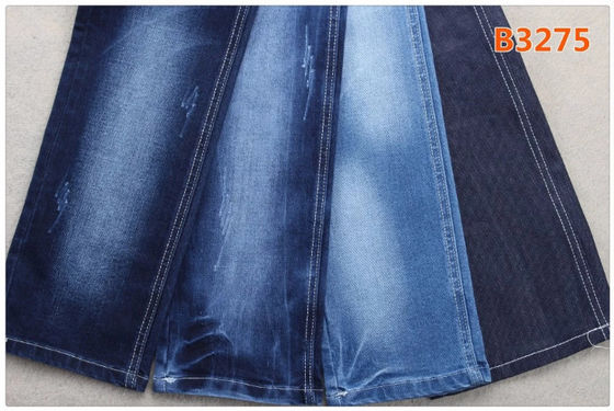 Prezzo buono i jeans di 9.5oz Slubby allungano il poliestere 2 Elastane del cotone 26 del materiale 69 del tessuto del denim in linea