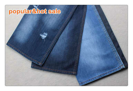 Prezzo buono Tessuto rigido Jean Material 12 Oz del denim del cotone della mano 100 del blu di indaco dei jeans dell'abito in linea