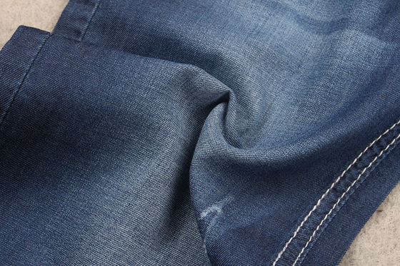 Prezzo buono Materiale della camicia del denim del tessuto del denim del cotone del blu di indaco della mano molle 4.5oz 100 in linea