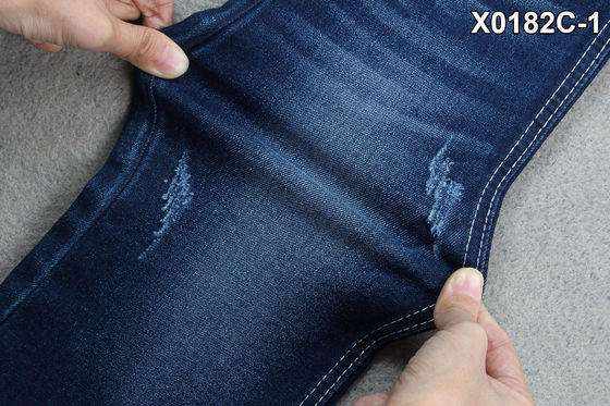 Prezzo buono Tessuto medio del denim della saia di allungamento del tessuto dei jeans delle donne del peso per i pantaloni regolari della ragazza in linea